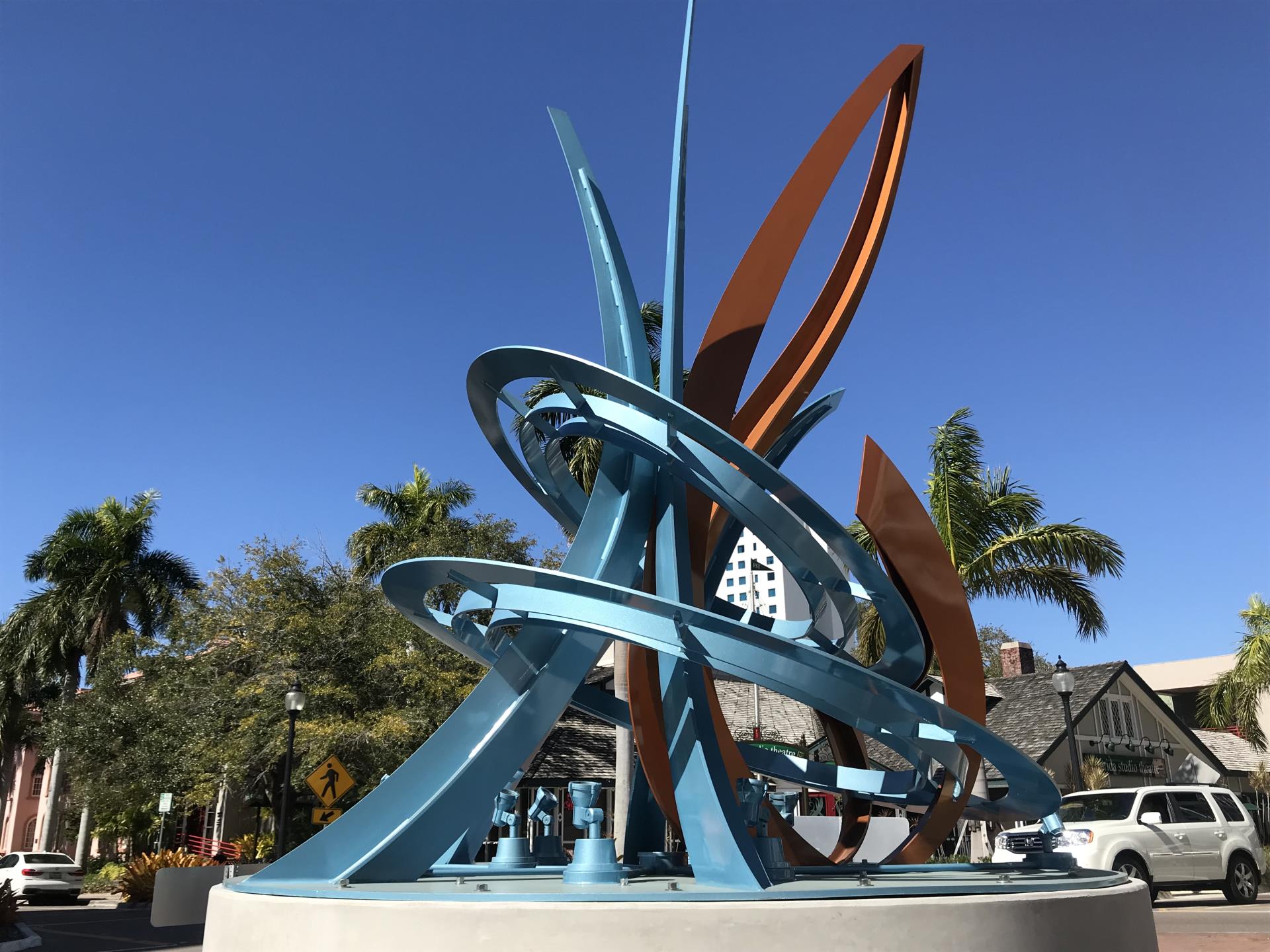 Jumping Fish sculpture at the Palm/Cocoanut avenue roundabout